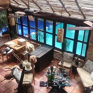 Casa De La Selva A 15 Min Aeropuerto Habitación en casa particular